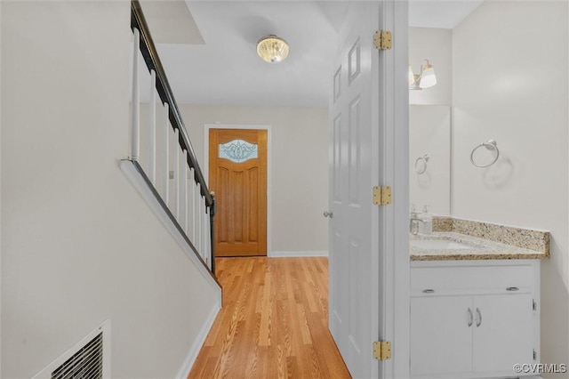 7906 Belmont Stakes Dr, Midlothian, VA 23112 - foyer entrance featuring stairs and light wood finished floors