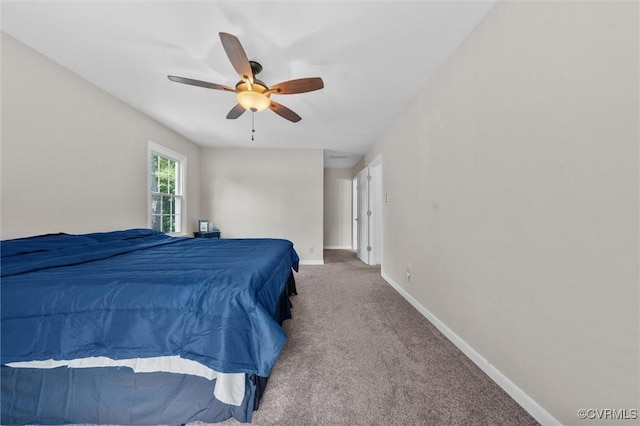 7906 Belmont Stakes Dr, Midlothian, VA 23112 - carpeted bedroom featuring baseboards and a ceiling fan