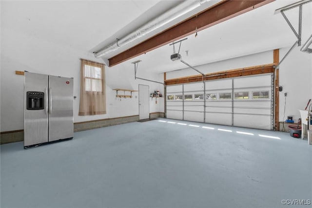 7906 Belmont Stakes Dr, Midlothian, VA 23112 - garage with stainless steel refrigerator with ice dispenser