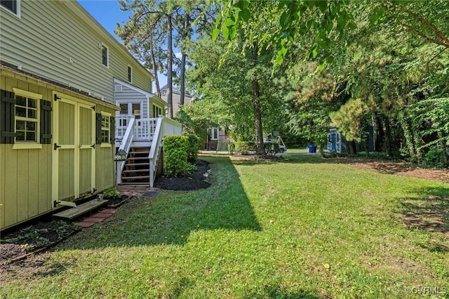 7906 Belmont Stakes Dr, Midlothian, VA 23112 - view of grassy yard with stairs and a deck
