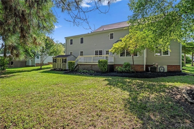 7906 Belmont Stakes Dr, Midlothian, VA 23112 - rear view of property with a wooden deck, a storage unit, and a yard