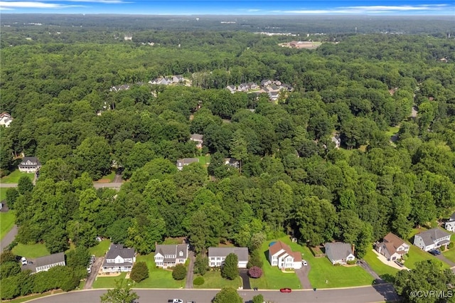 7906 Belmont Stakes Dr, Midlothian, VA 23112 - aerial view of property and surrounding area with a heavily wooded area and nearby suburban area