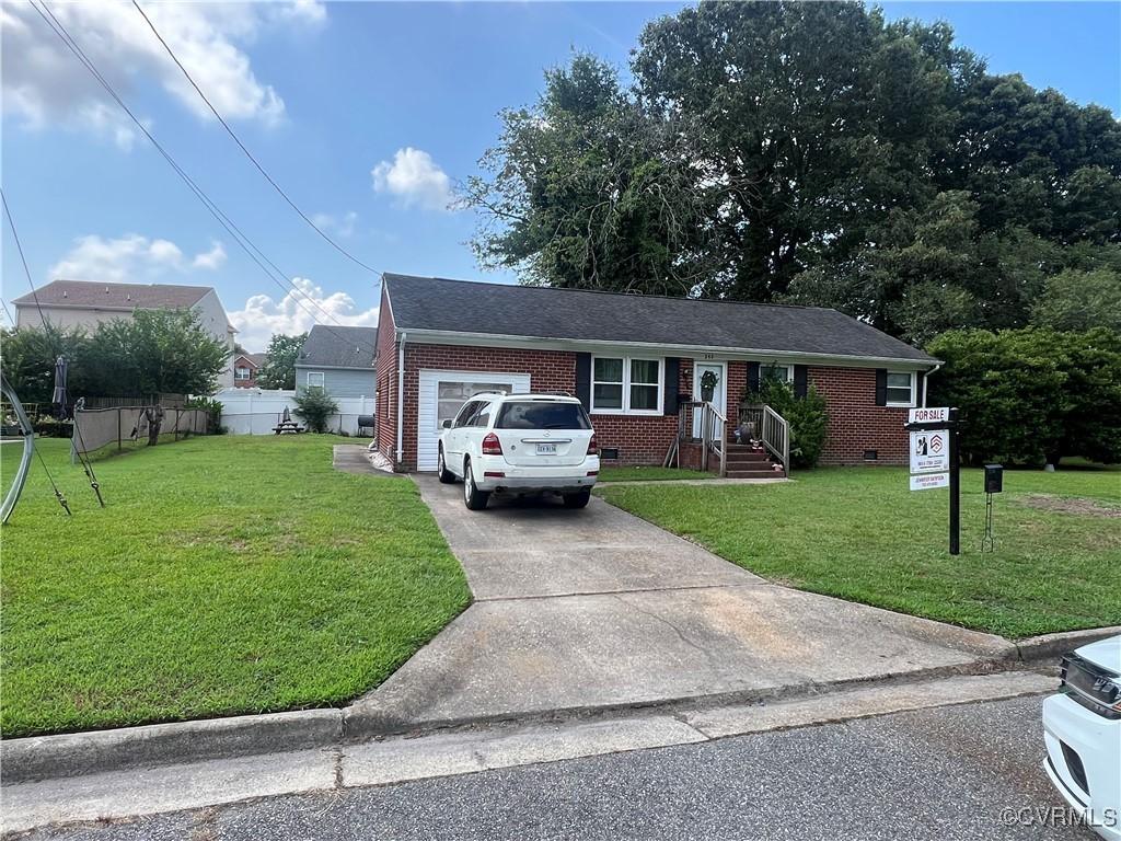 242 Bannon Ct, Hampton, VA 23666 - single story home with driveway, brick siding, an attached garage, and crawl space