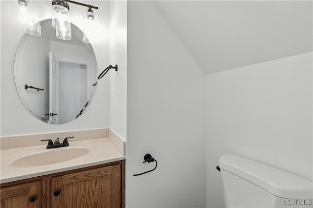 11918 Hazelnut Branch Ter, Midlothian, VA 23112 - bathroom featuring vanity and vaulted ceiling