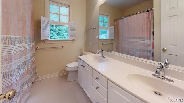 2024 Rockstone Pl, Henrico, VA 23238 - bathroom with double vanity, tile patterned floors, and a shower with curtain