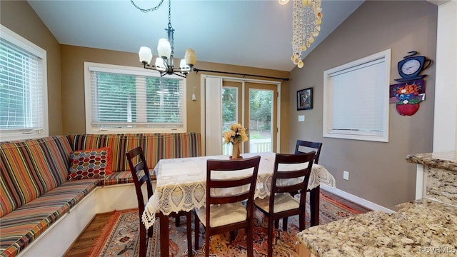 2024 Rockstone Pl, Henrico, VA 23238 - dining room with a chandelier, wood finished floors, and vaulted ceiling