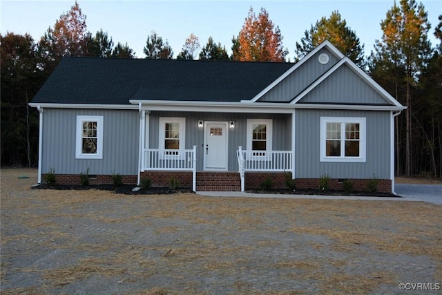 5102 Front Dr, North Dinwiddie, VA 23803 - single story home featuring crawl space, covered porch, and roof with shingles