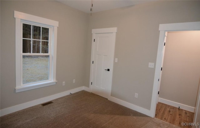 5102 Front Dr, North Dinwiddie, VA 23803 - carpeted empty room featuring baseboards