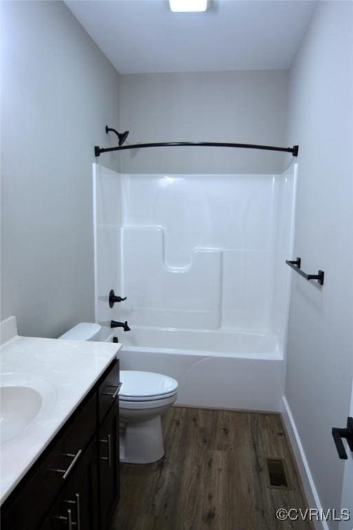 5102 Front Dr, North Dinwiddie, VA 23803 - full bath featuring vanity, wood finished floors, and tub / shower combination