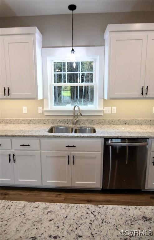 5102 Front Dr, North Dinwiddie, VA 23803 - kitchen with dishwasher, white cabinets, dark wood-style flooring, and decorative light fixtures