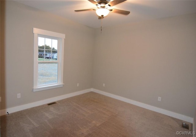 5102 Front Dr, North Dinwiddie, VA 23803 - carpeted empty room with ceiling fan and baseboards