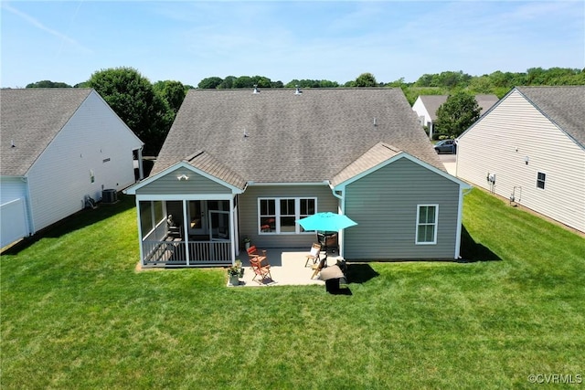 7413 Settlers Ridge Ct, Henrico, VA 23231 - rear view of house featuring a patio, a sunroom, a lawn, and a shingled roof