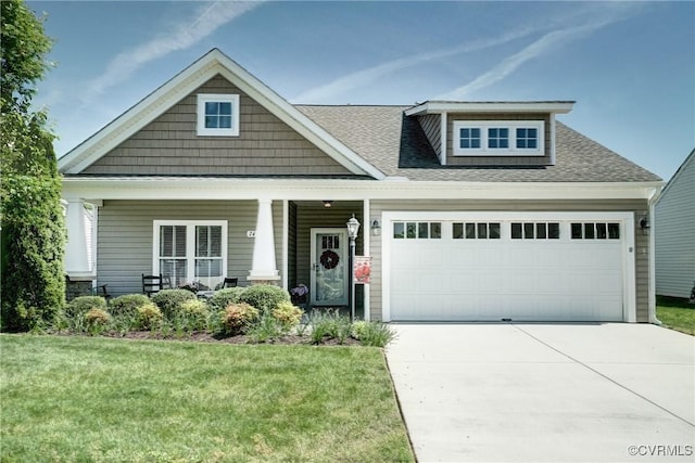 7413 Settlers Ridge Ct, Henrico, VA 23231 - craftsman house with concrete driveway, a front yard, a porch, a garage, and roof with shingles