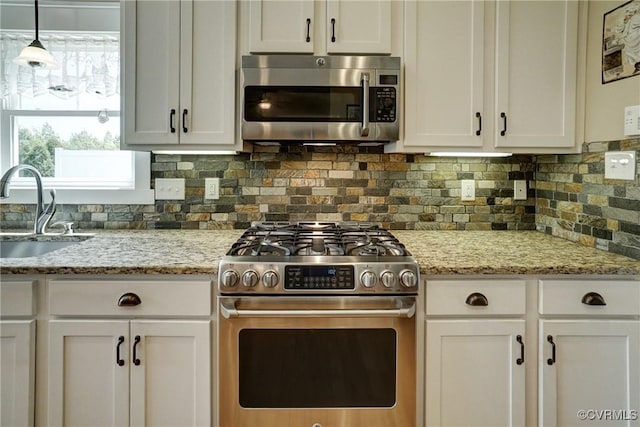 7413 Settlers Ridge Ct, Henrico, VA 23231 - kitchen featuring stainless steel appliances, white cabinetry, and backsplash