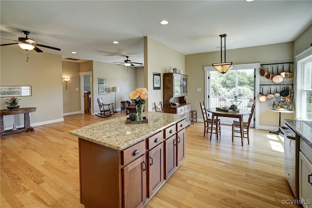 7413 Settlers Ridge Ct, Henrico, VA 23231 - kitchen with ceiling fan, light wood-style flooring, light stone countertops, and recessed lighting