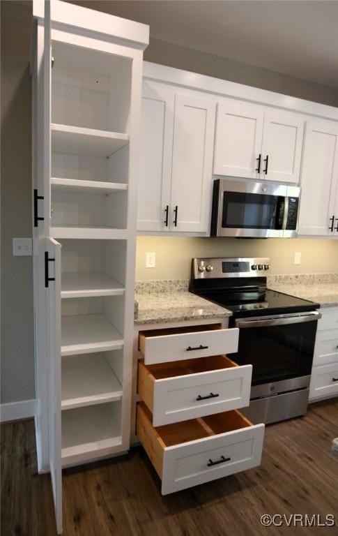 5104 Front Dr, North Dinwiddie, VA 23803 - kitchen with stainless steel appliances, open shelves, dark wood-type flooring, and white cabinetry