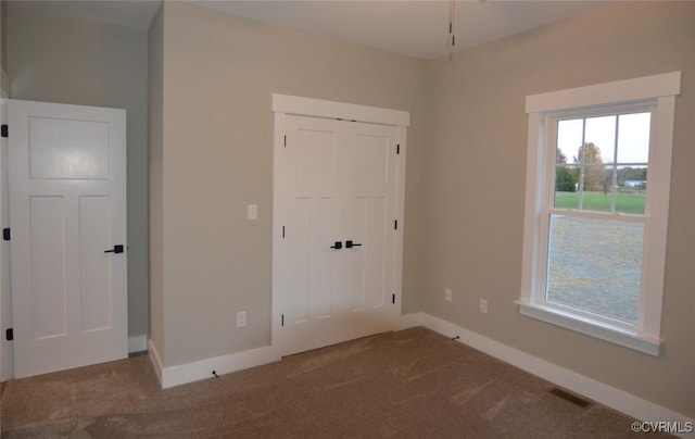 5104 Front Dr, North Dinwiddie, VA 23803 - carpeted spare room with baseboards