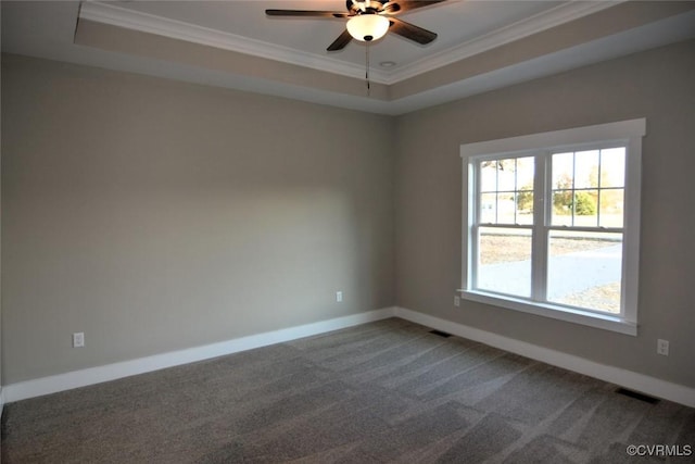 5104 Front Dr, North Dinwiddie, VA 23803 - spare room featuring crown molding, a ceiling fan, carpet floors, and a raised ceiling