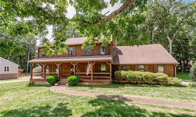 4320 Dunraven Rd, Chesterfield, VA 23236 - view of front of house with a porch, a front yard, and a chimney