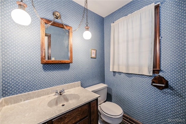 4320 Dunraven Rd, Chesterfield, VA 23236 - half bathroom featuring vanity and wallpapered walls