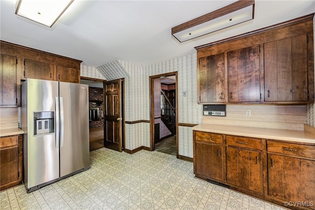 4320 Dunraven Rd, Chesterfield, VA 23236 - kitchen with stainless steel refrigerator with ice dispenser, wallpapered walls, light countertops, and light flooring