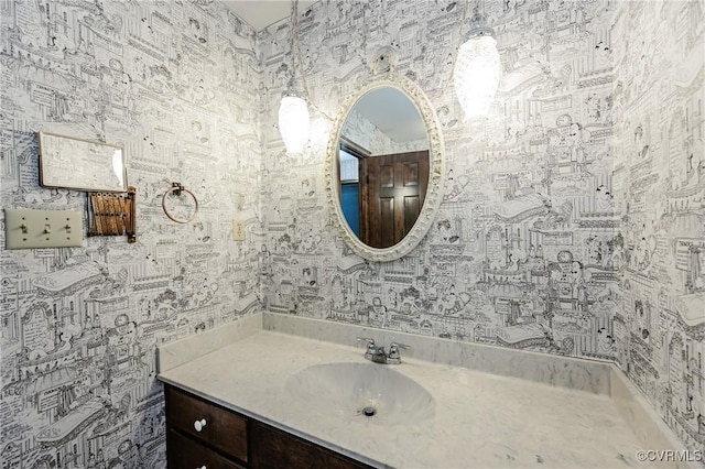 4320 Dunraven Rd, Chesterfield, VA 23236 - bathroom with wallpapered walls and vanity