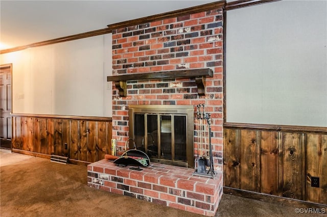 4320 Dunraven Rd, Chesterfield, VA 23236 - detailed view of carpet, ornamental molding, a wainscoted wall, a fireplace, and wooden walls