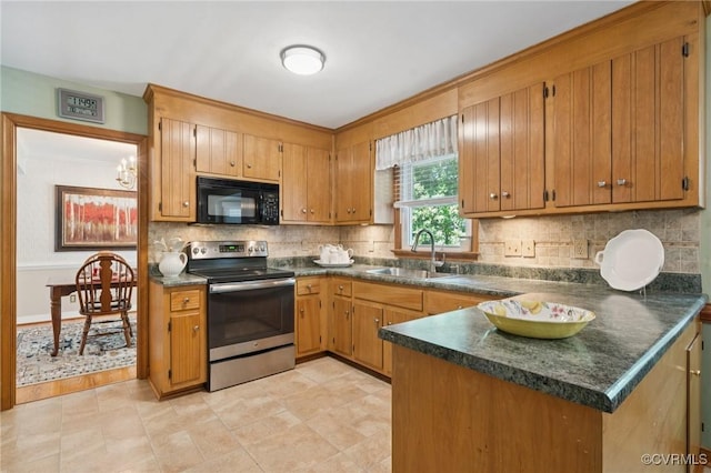 3000 Cove Ridge Rd, Midlothian, VA 23112 - kitchen with stainless steel range with electric cooktop, black microwave, dark countertops, tasteful backsplash, and brown cabinetry
