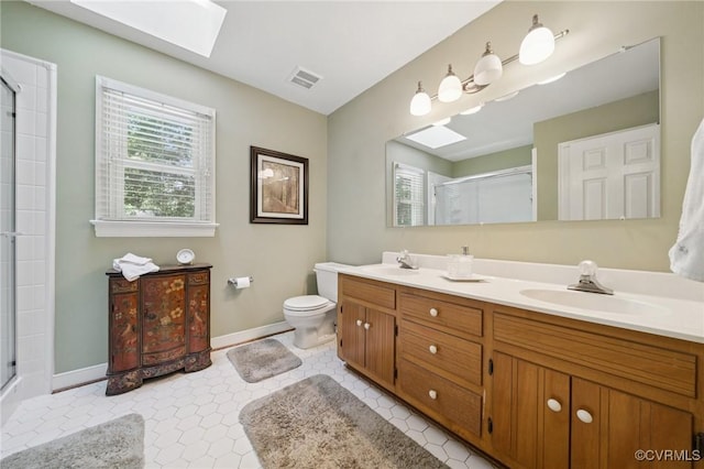 3000 Cove Ridge Rd, Midlothian, VA 23112 - bathroom with a skylight, a shower with shower door, and double vanity