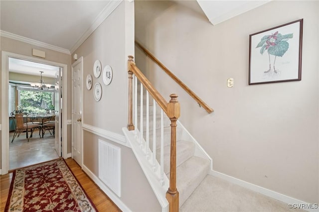 3000 Cove Ridge Rd, Midlothian, VA 23112 - staircase featuring a chandelier, wood finished floors, and ornamental molding