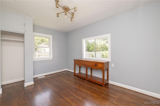 6500 W Grace St, Henrico, VA 23226 - unfurnished bedroom featuring hardwood / wood-style floors and a closet