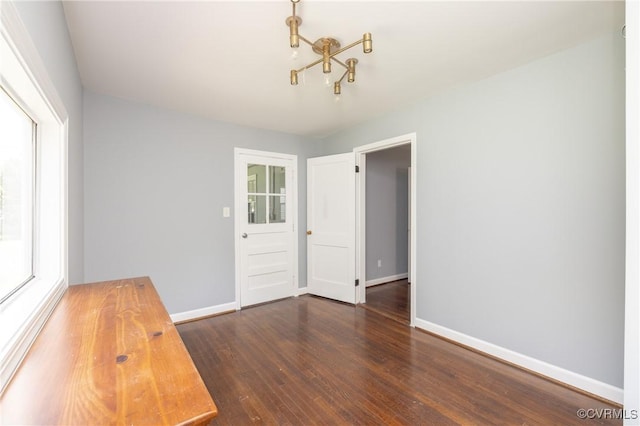 6500 W Grace St, Henrico, VA 23226 - spare room with baseboards and wood finished floors