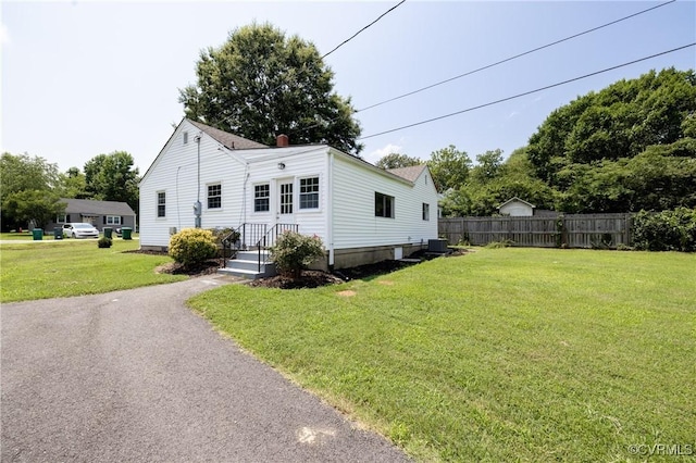 6500 W Grace St, Henrico, VA 23226 - bungalow-style house with a chimney
