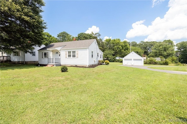 6500 W Grace St, Henrico, VA 23226 - view of front of property featuring a garage, a front lawn, an outdoor structure, and a chimney