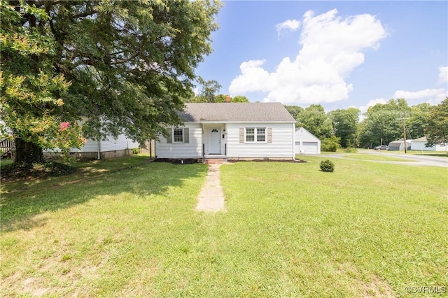 6500 W Grace St, Henrico, VA 23226 - bungalow-style home with a front lawn, a garage, and an outdoor structure
