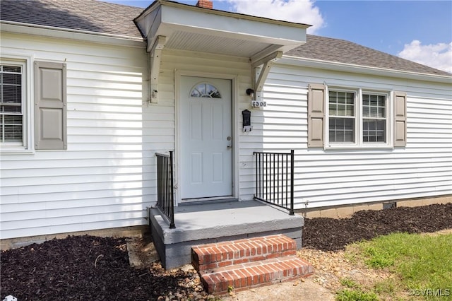 6500 W Grace St, Henrico, VA 23226 - property entrance featuring roof with shingles and a chimney