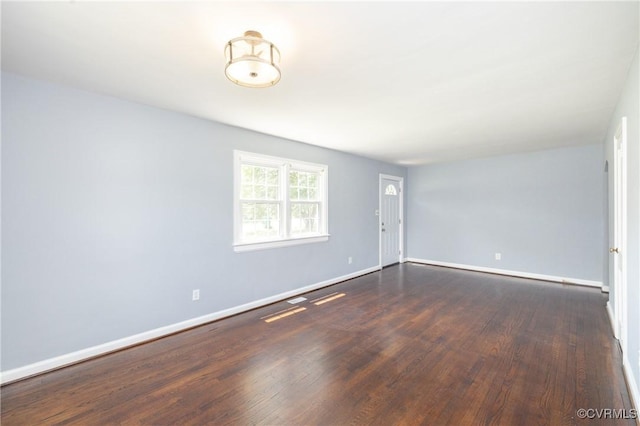 6500 W Grace St, Henrico, VA 23226 - unfurnished room with baseboards and dark wood-style floors
