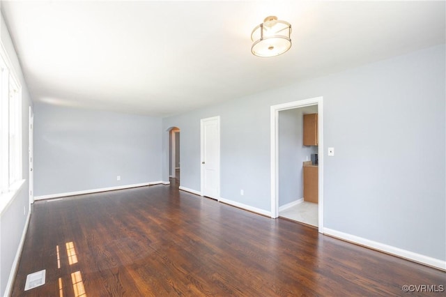 6500 W Grace St, Henrico, VA 23226 - unfurnished room featuring arched walkways and wood finished floors