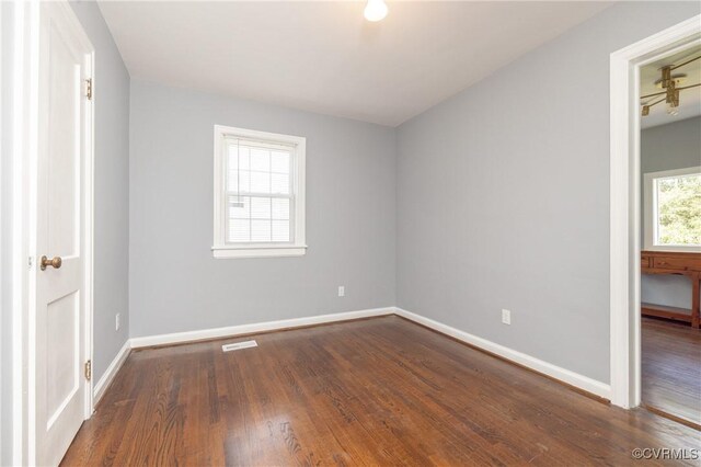 6500 W Grace St, Henrico, VA 23226 - unfurnished bedroom featuring wood finished floors