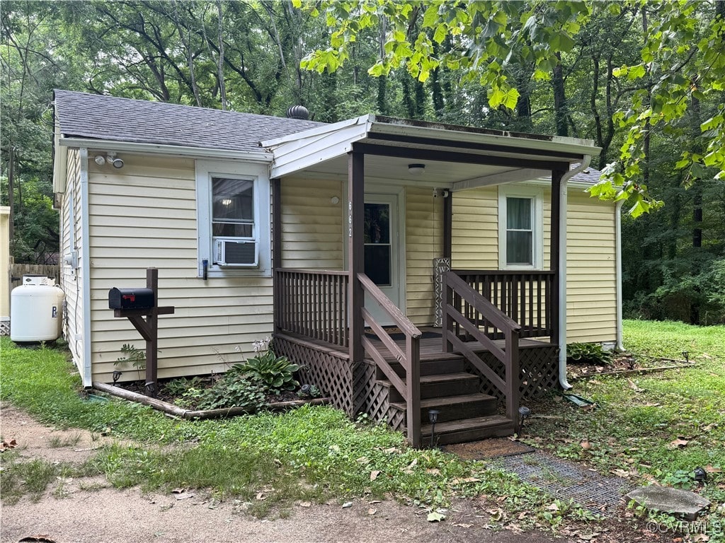 662 Wise Ave, Richmond, VA 23803 - bungalow featuring a shingled roof and cooling unit