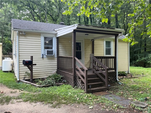 662 Wise Ave, Richmond, VA 23803 - bungalow featuring a shingled roof and cooling unit