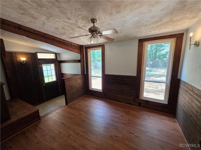 11220 Sunfield Dr, Midlothian, VA 23112 - entrance foyer featuring wainscoting, wooden walls, wood finished floors, ceiling fan, and a textured ceiling