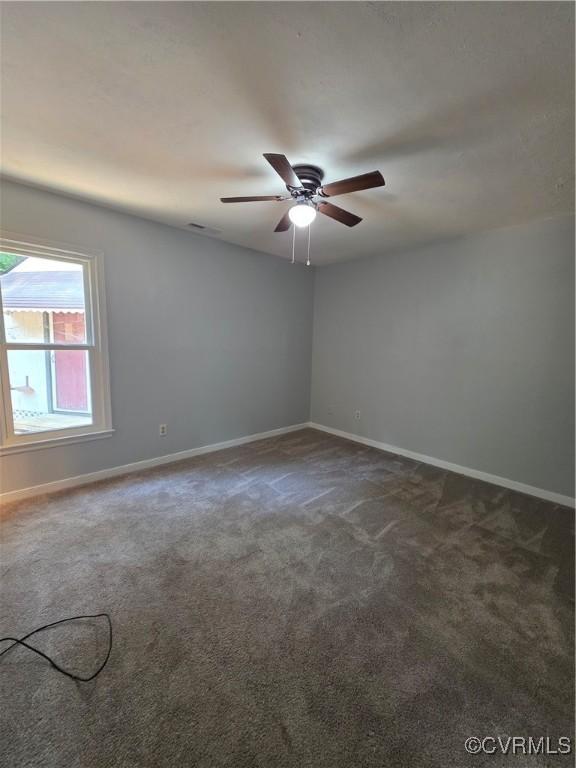 11220 Sunfield Dr, Midlothian, VA 23112 - carpeted spare room featuring a ceiling fan and baseboards