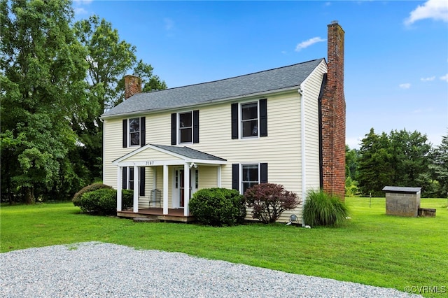 3167 Trenholm Rd, Powhatan, VA 23139 - view of front of house featuring a chimney, a porch, and a front yard