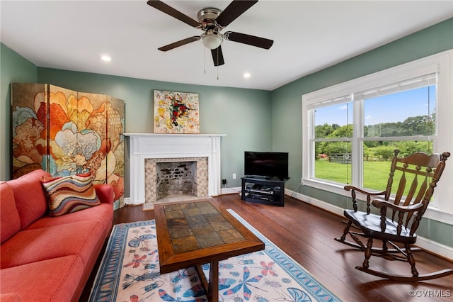 3167 Trenholm Rd, Powhatan, VA 23139 - living area with wood finished floors, a ceiling fan, a fireplace with flush hearth, and recessed lighting