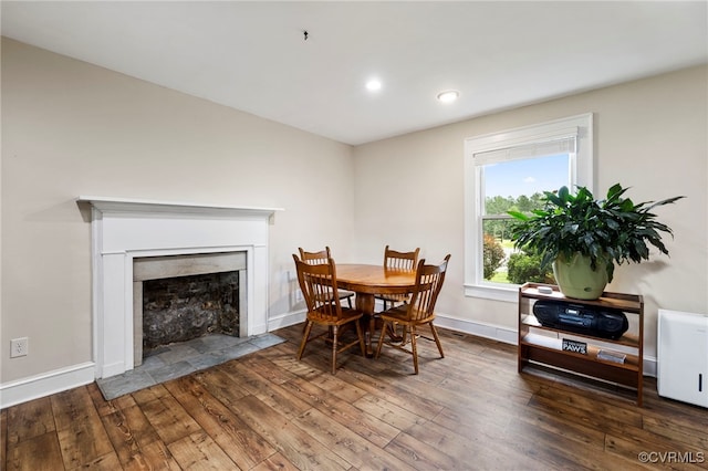 3167 Trenholm Rd, Powhatan, VA 23139 - dining room with wood-type flooring, a premium fireplace, and recessed lighting