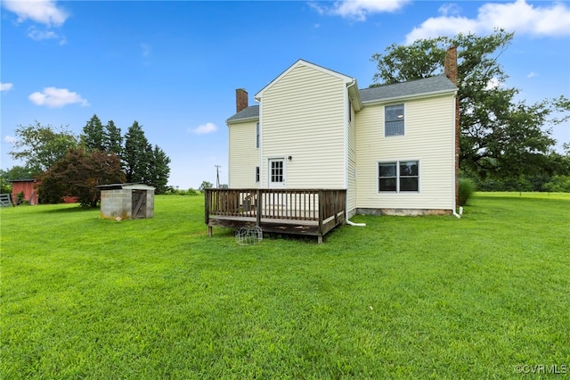 3167 Trenholm Rd, Powhatan, VA 23139 - rear view of property featuring a chimney, a deck, and a lawn