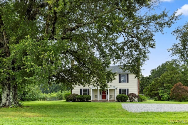 3167 Trenholm Rd, Powhatan, VA 23139 - view of front of house with a porch and a front lawn