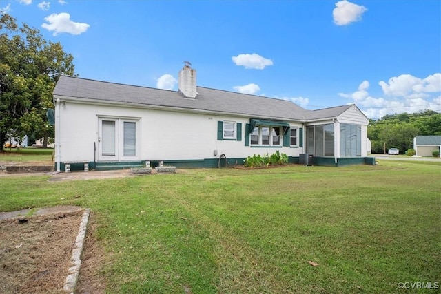 1415 New Market Rd 1411, Henrico, VA 23231 - back of property featuring a chimney and a lawn
