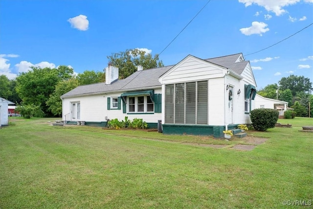 1415 New Market Rd 1411, Henrico, VA 23231 - back of property with a yard and a chimney